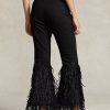 Jean évasé taille haute noir Ralph Lauren pour femme, orné de plumes et de perles
