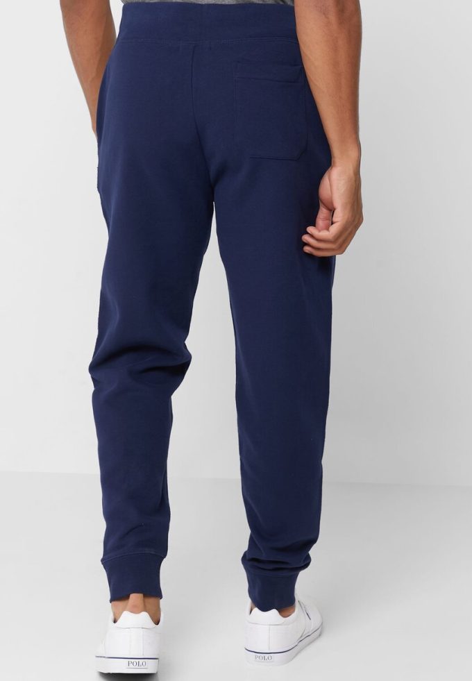 Pantalon de survêtement bleu marine Ralph Lauren pour homme avec cordon de serrage et revers Pantalon de survêtement bleu marine Ralph Lauren pour homme avec cordon de serrage et revers
