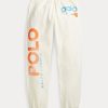 Pantalon de survêtement en molleton crème pour femme Ralph Lauren avec logo et motif vague Pantalon de survêtement en molleton crème pour femme Ralph Lauren avec logo et motif vague