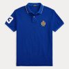 Polo Ralph Lauren bleu coupe classique pour homme avec écusson en maille Polo Ralph Lauren bleu coupe classique pour homme avec écusson en maille