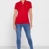 Polos rouges à boutons Ralph Lauren pour femmes Polos rouges à boutons Ralph Lauren pour femmes