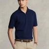 Polos zippés en maille extensible bleu marine Ralph Lauren pour homme Polos zippés en maille extensible bleu marine Ralph Lauren pour homme