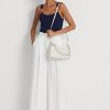 Sac à main Ralph Lauren en cuir à pois bleu marine/crème pour femme, taille moyenne Sac à main Ralph Lauren en cuir à pois bleu marine/crème pour femme, taille moyenne