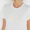 T-shirts blancs à col rond et imprimé graphique Ralph Lauren pour femmes T-shirts blancs à col rond et imprimé graphique Ralph Lauren pour femmes