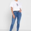 T-shirts blancs à col rond et imprimé graphique Ralph Lauren pour femmes T-shirts blancs à col rond et imprimé graphique Ralph Lauren pour femmes