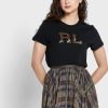 T-shirts noirs à col rond et logo Ralph Lauren pour femmes T-shirts noirs à col rond et logo Ralph Lauren pour femmes
